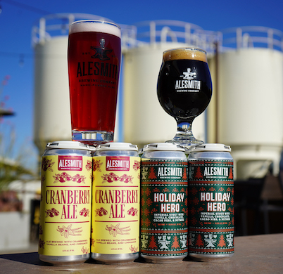 https://alesmith.com/wp-content/uploads/2023/10/Holiday-Hero-Cranberry-Ale-Cans-with-Pours.jpg
